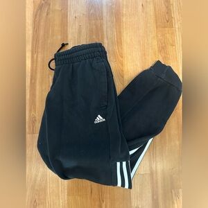 Adidas black joggers with white stripes and logo small